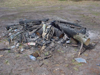 Bonfire and trash east of Anderson Creek